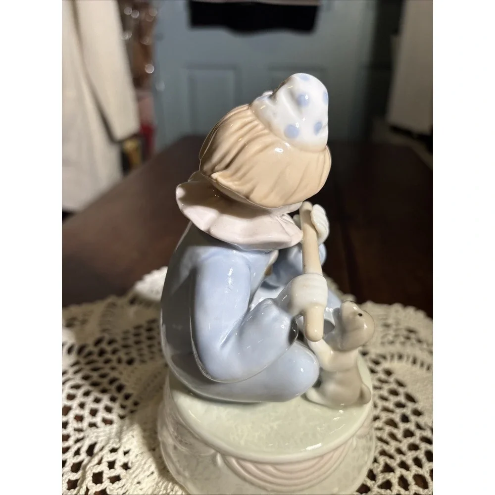 Paul Sebastian Clown Playing Flute with Dog Porcelain Figurine Music Box 7.5